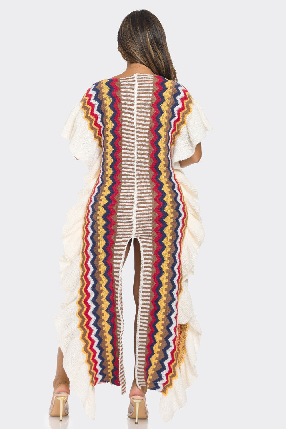 Woman wearing a colorful patterned cover-up on a white background