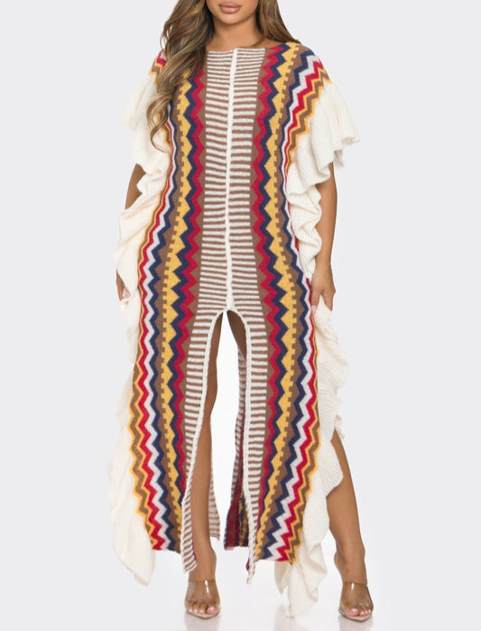 Woman wearing a colorful striped dress with a white background