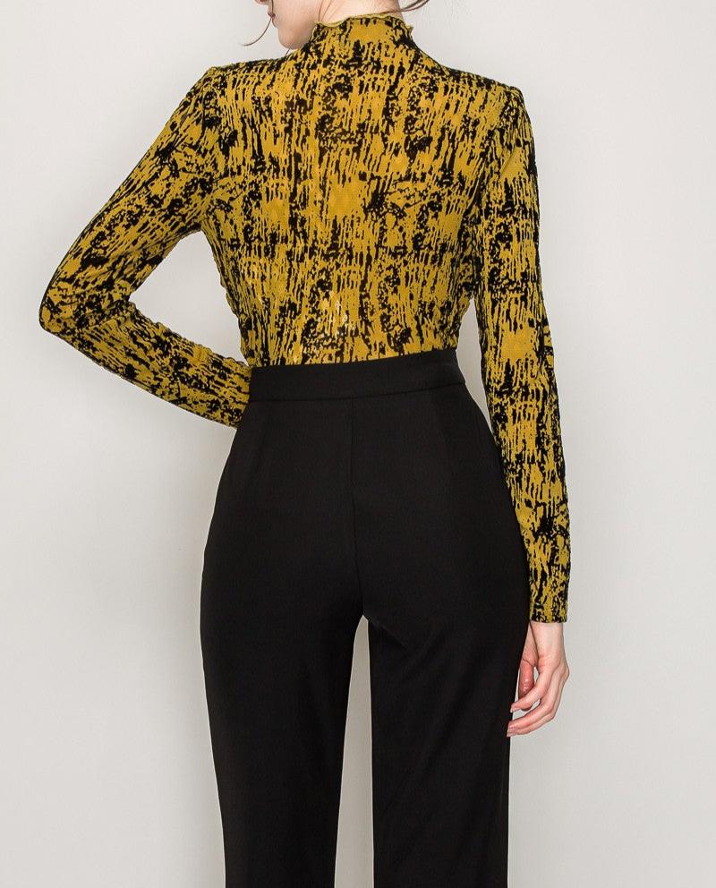 Women's long sleeve abstract print top