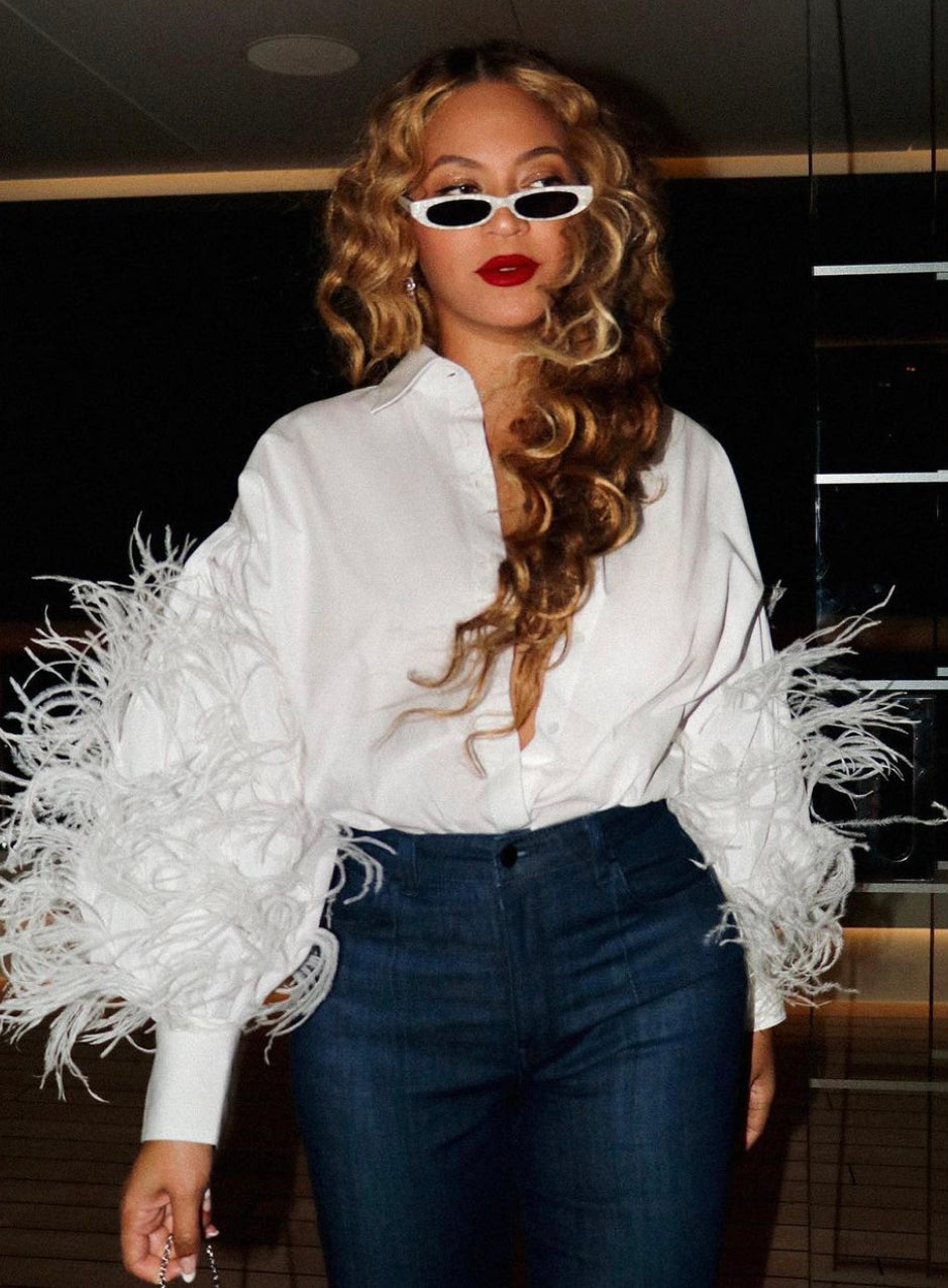 Beyonce Spotted Yachting in Capri With Jay - Z Wearing Valentino White Feather Blouse