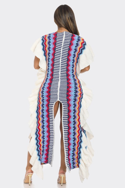 Woman wearing a colorful striped dress with a white background