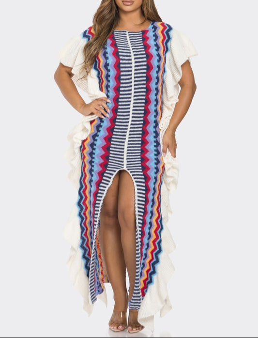 Woman wearing a colorful striped dress with a white background