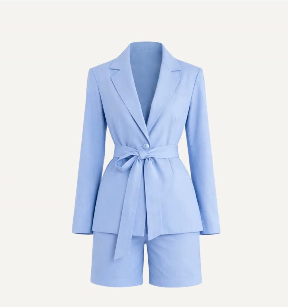 Light blue suit with a blazer and shorts on a white background